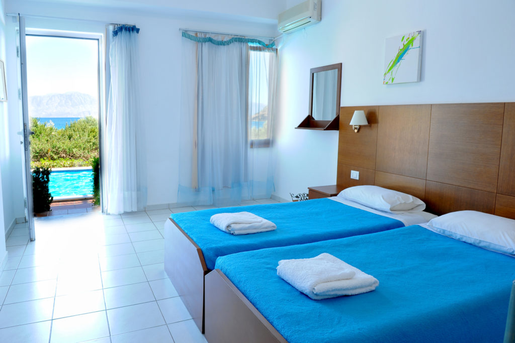 Family One-Bedroom Apartment with Sea View Main Bedroom and view 1 Mirabella Apartments Agios Nikolas Crete